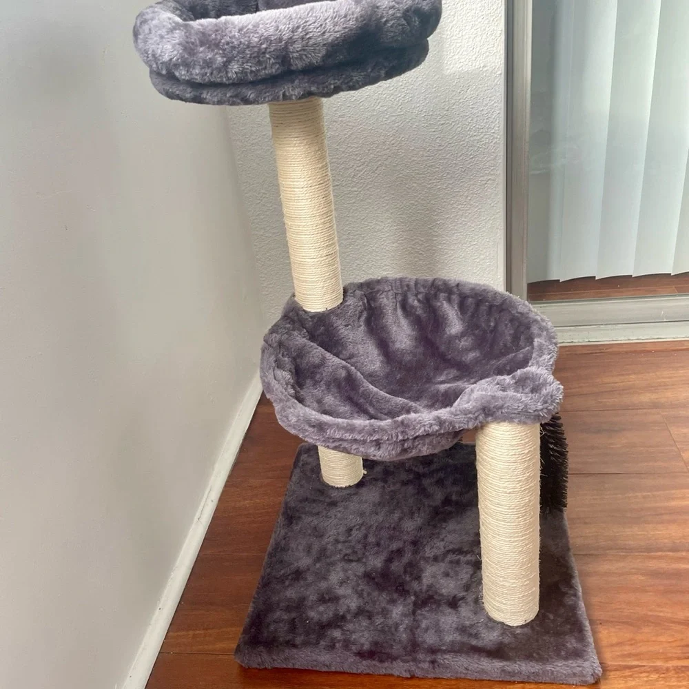 Like new, almost never used cat scratcher / hang out.